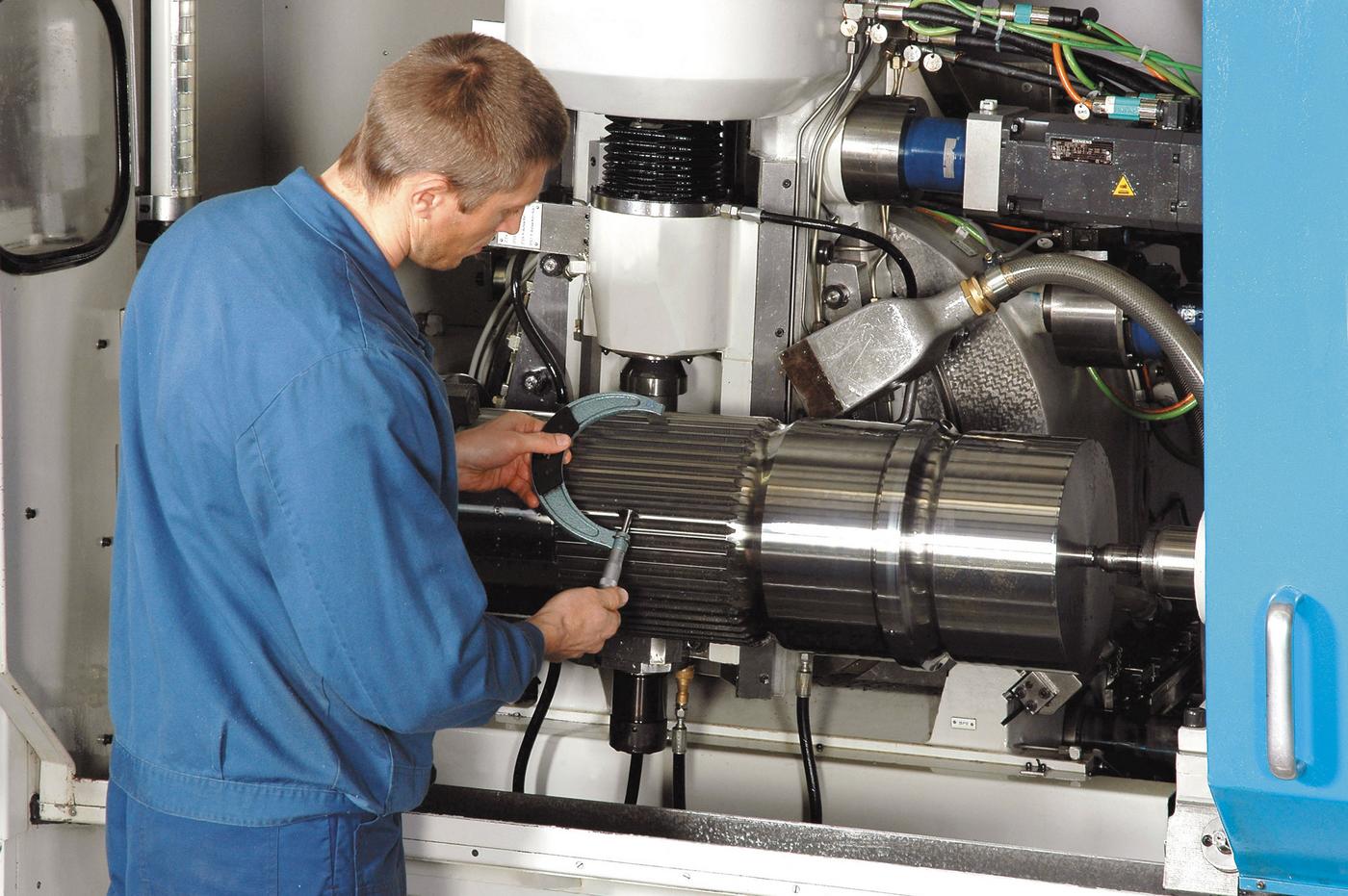 Werknemers Werknemers in productie bij een machine